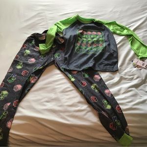 Never worn Minecraft pajamas size 8 with tags.